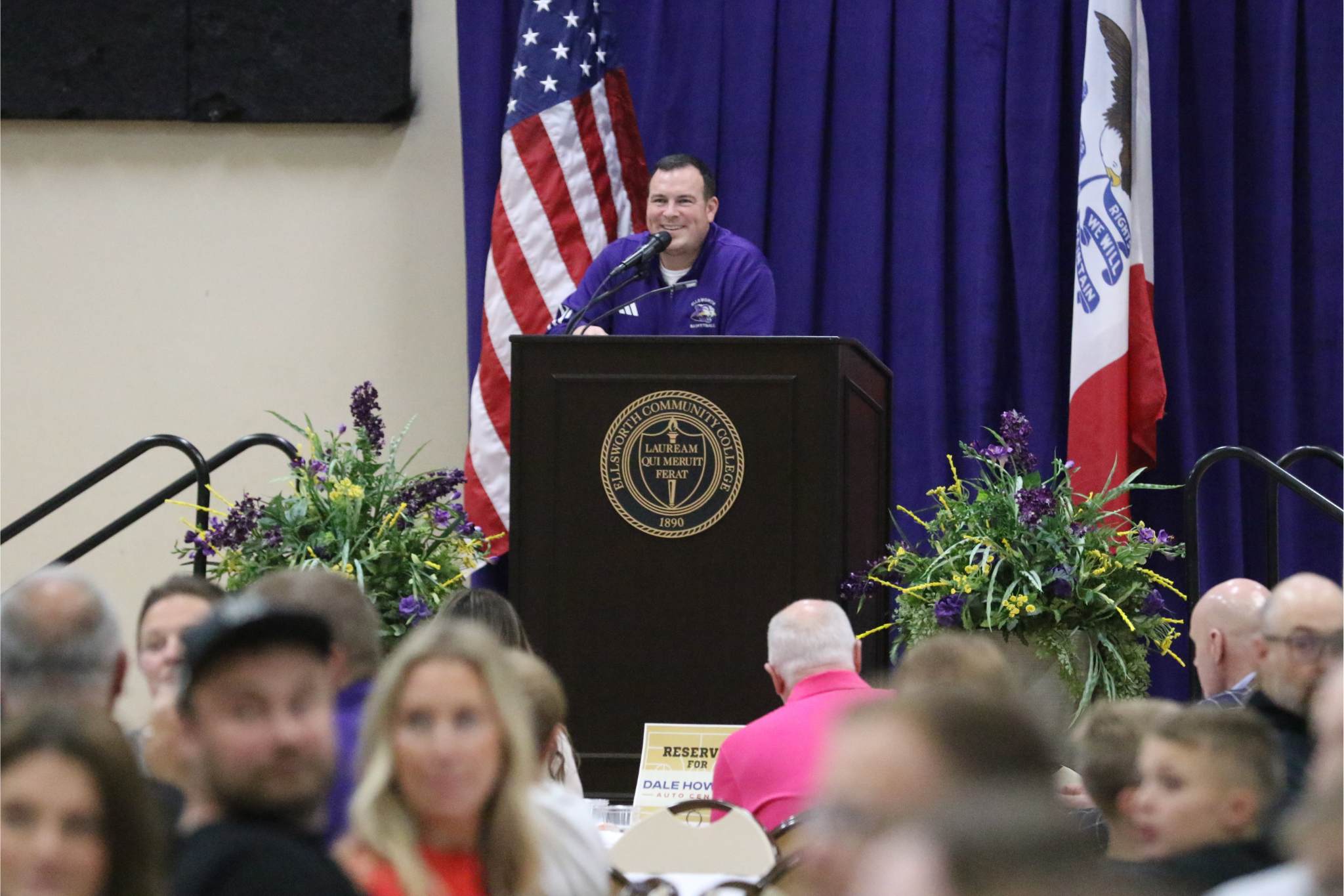 Coach Bryan Bender speaks to a crowd during the Panther tip-off dinner. 